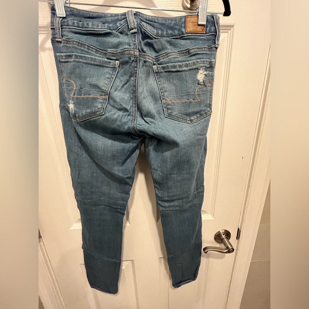 AE Women’s Distressed Blue Jean Jeggings - Picture 2 of 4
